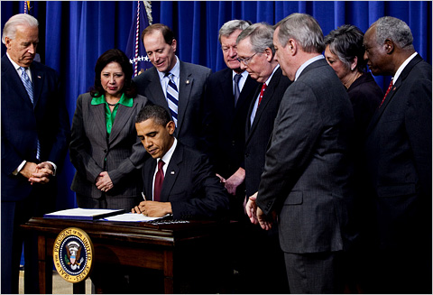 Obama signs the new tax bill into law